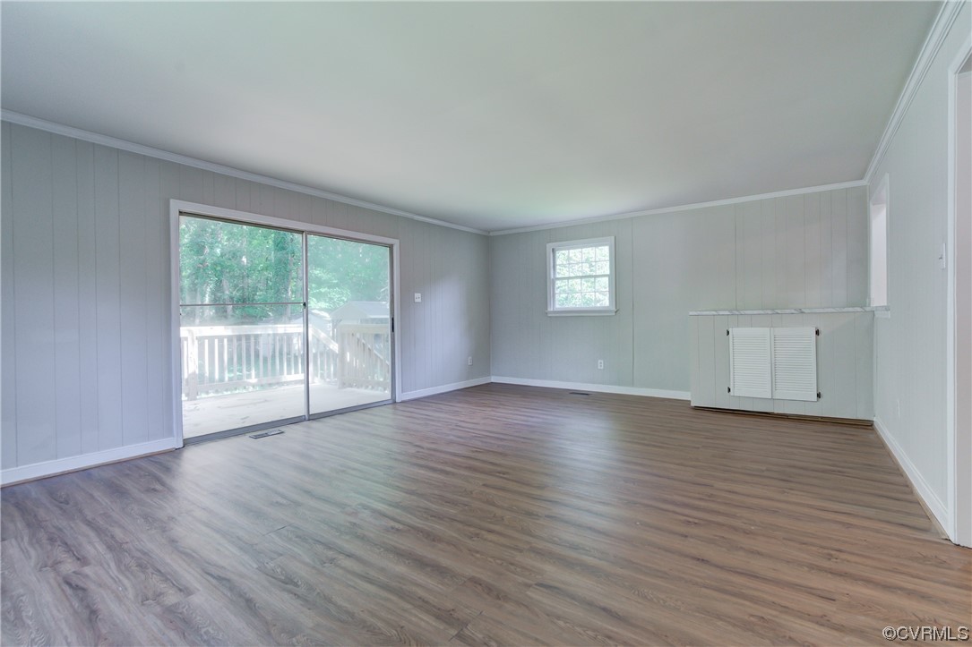 1510 Schloss Road Richmond, VA 23225 - Photo 13 of 28 a view of an empty room with wooden floor and a window