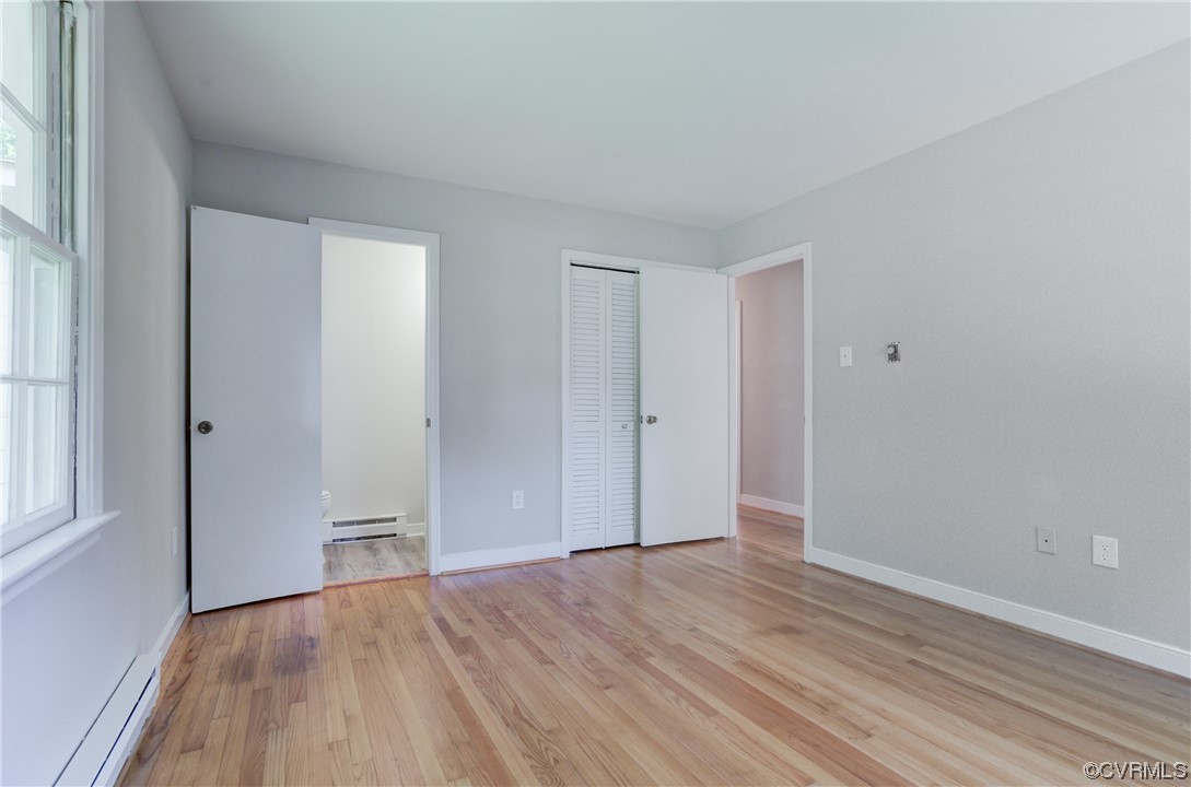 1510 Schloss Road Richmond, VA 23225 - Photo 17 of 28 a view of wooden floor and windows in a room