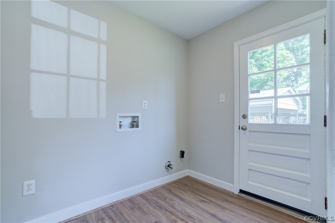 1510 Schloss Road Richmond, VA 23225 - Photo 18 of 28 a view of an empty room with wooden floor and a window