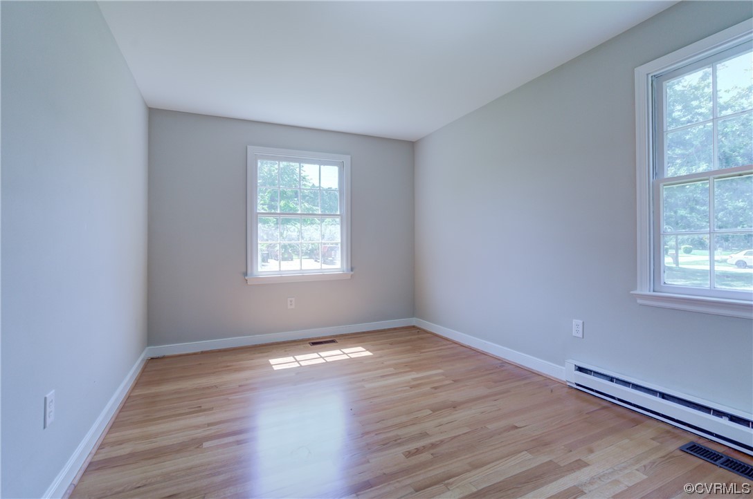 1510 Schloss Road Richmond, VA 23225 - Photo 20 of 28 an empty room with wooden floor and windows