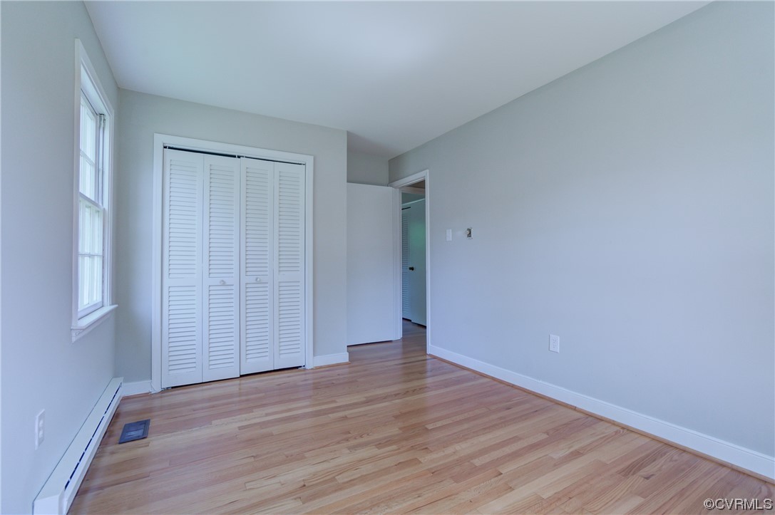 1510 Schloss Road Richmond, VA 23225 - Photo 21 of 28 a view of an empty room with wooden floor