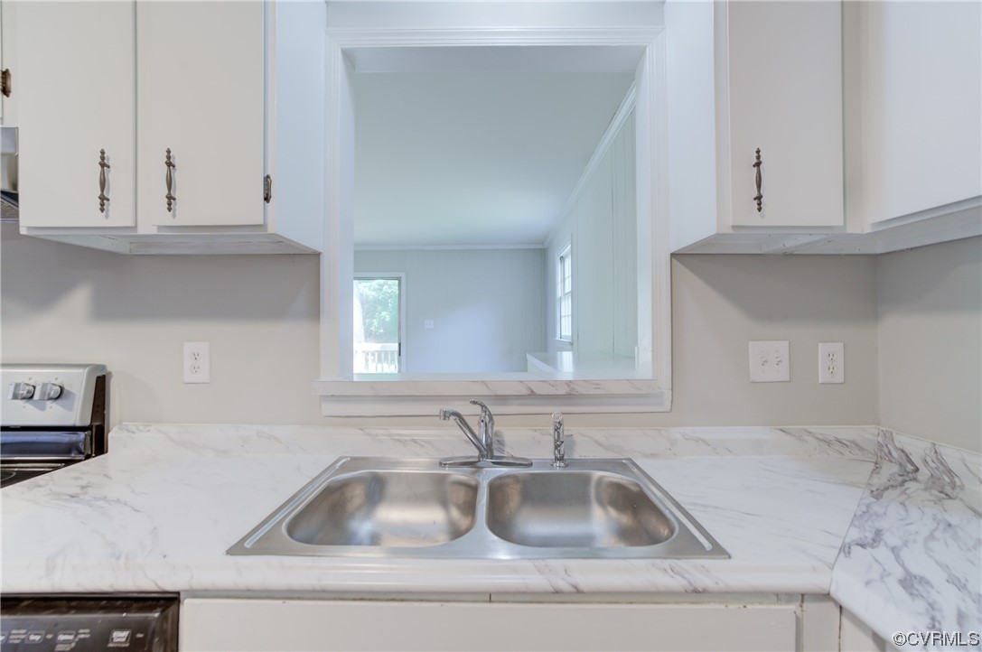 1510 Schloss Road Richmond, VA 23225 - Photo 10 of 28 a kitchen sink with cabinets