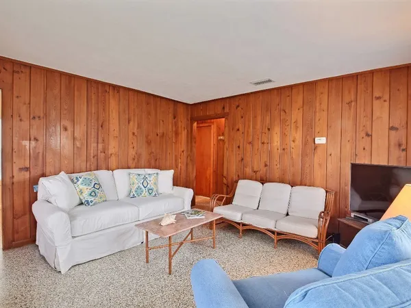 a living room with furniture and a couch