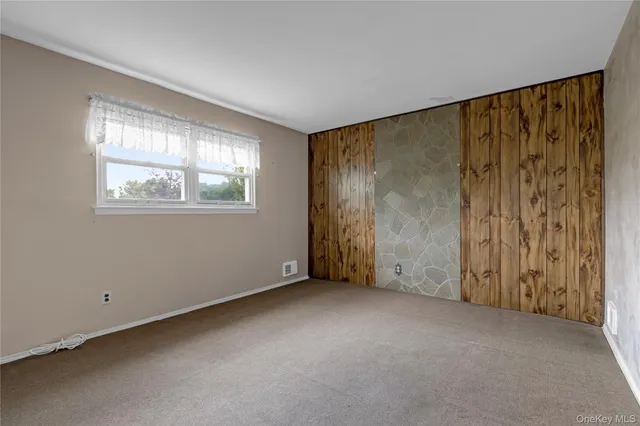 an empty room with a workspace