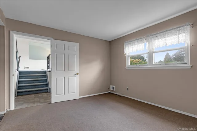 a bathroom with a sink toilet and mirror