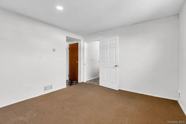 an empty room with an entryway