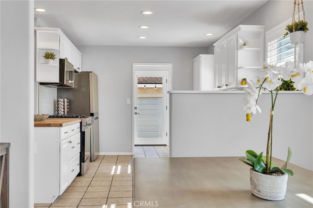 4838 Fidler Avenue Long Beach, CA 90808 - Photo 12 of 56 Light & Bright Kitchen With Recessed Lighting.