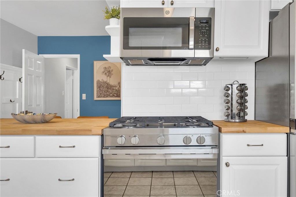 4838 Fidler Avenue Long Beach, CA 90808 - Photo 15 of 56 Kitchen Open Breakfast Nook Over Looking Into the Family Room.