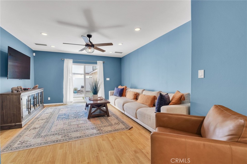 4838 Fidler Avenue Long Beach, CA 90808 - Photo 21 of 56 Spacious Family Room, Recessed Lighting, Ceiling Fan & Sliding Door Leading to Rear Yard.