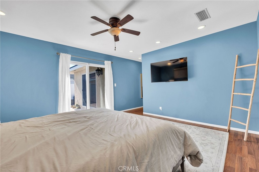 4838 Fidler Avenue Long Beach, CA 90808 - Photo 27 of 56 Another Interior View of the Primary Bedroom of Sliding Door Leading to Rear Yard.