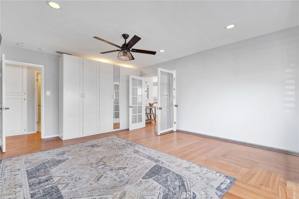 4838 Fidler Avenue Long Beach, CA 90808 - Photo 40 of 56 Virtually Removed Furniture Items from Front 4th Bedroom / Living Room. Different Angle of Photo of Built In Closets.