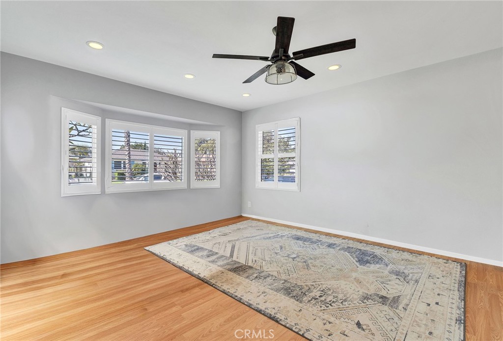 4838 Fidler Avenue Long Beach, CA 90808 - Photo 42 of 56 Virtually Removed Furniture Items from 4th Bedroom / Front Living Room a Different Photo Angle of Front Windows.