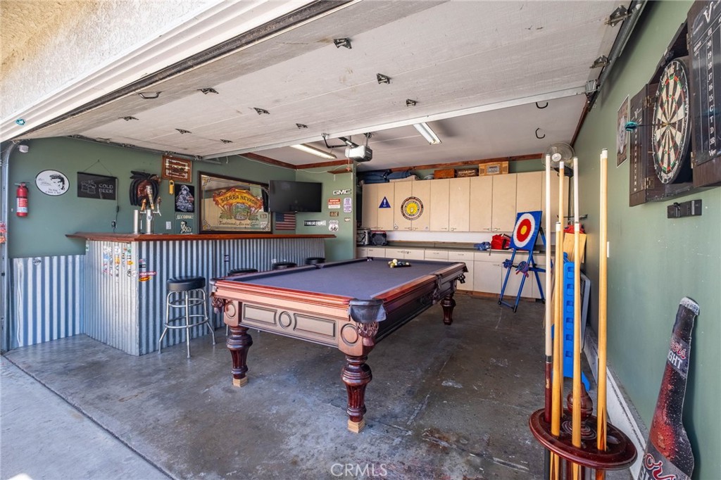 4838 Fidler Avenue Long Beach, CA 90808 - Photo 46 of 56 Garage Currently Serves as a Versatile Entertainment Space for the Family.