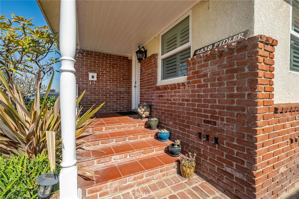 4838 Fidler Avenue Long Beach, CA 90808 - Photo 6 of 56 Lovely Exterior Brick Hardscape.