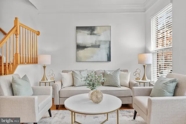 a bathroom with a sink toilet and a mirror