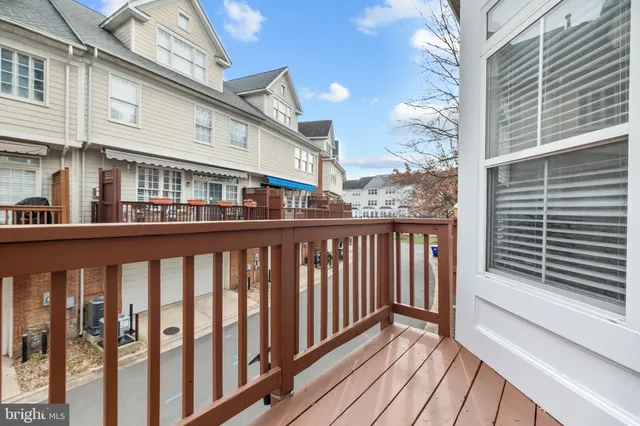a bathroom with a sink double vanity and a toilet