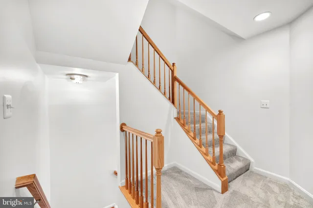 a view of room with window and shelf