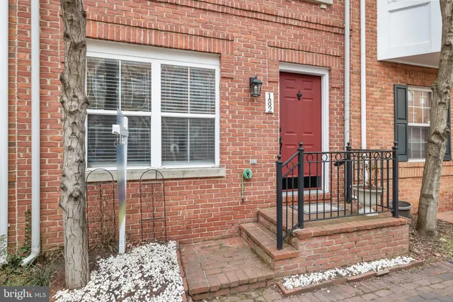 a view of a room with a large window and chair