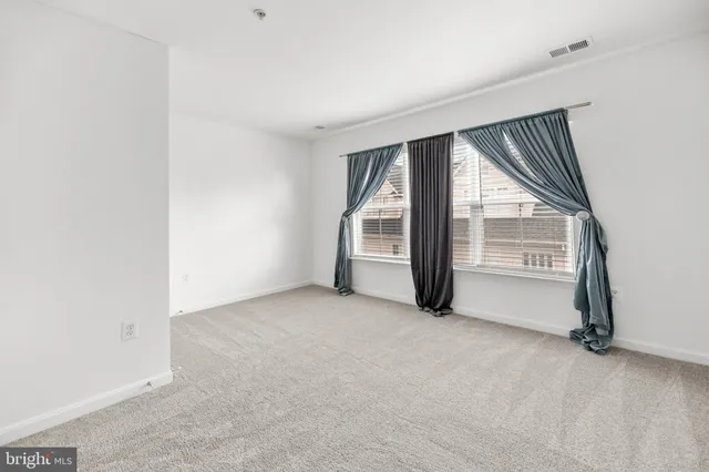 an aerial view of residential house with outdoor space and street view