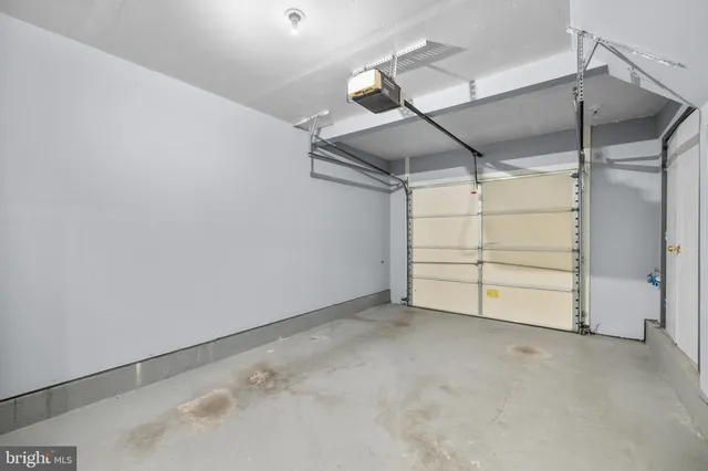 a view of a cafe with a couple of people seating