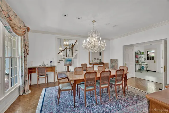 a view of a dining room with furniture