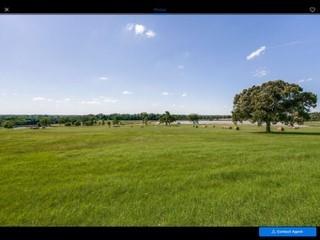 393 Vz Country Road Canton, TX 75103 - Photo 2 of 5 a view of a large body of water with a building in the background