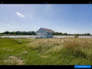 393 Vz Country Road Canton, TX 75103 - Photo 3 of 5 a view of a lake with houses in the background