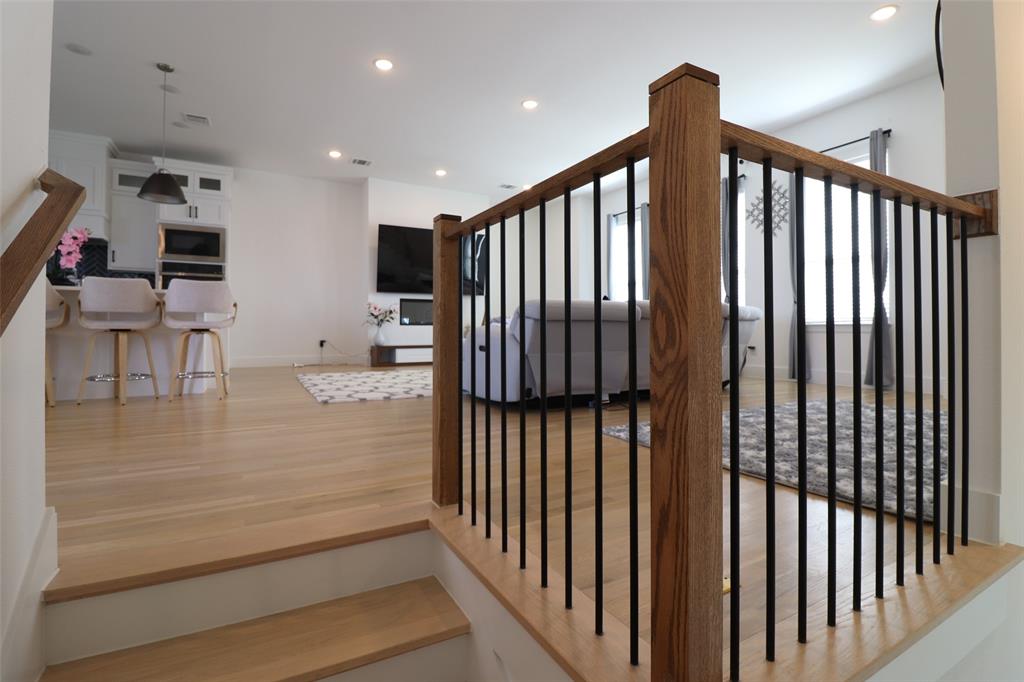 1205 Marc Place Rowlett, TX 75088 - Photo 11 of 30 a view of entryway and hall with wooden floor