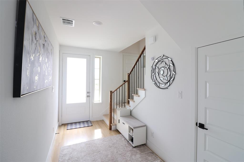 1205 Marc Place Rowlett, TX 75088 - Photo 10 of 30 a view of entryway with stairs and a window