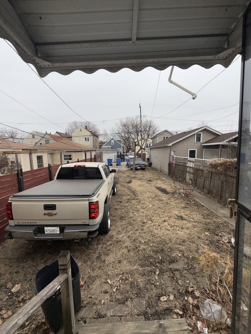 2847 South Harding Avenue Chicago, IL 60623 - Photo 12 of 12 a car parked on the side of the road