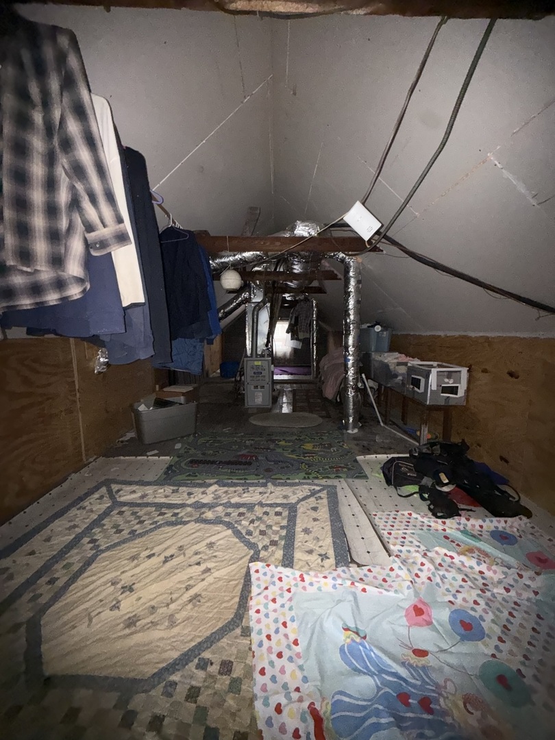 2847 South Harding Avenue Chicago, IL 60623 - Photo 10 of 12 a room with lots of storage and utility