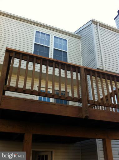 6394 Stagg Court Springfield, VA 22150 - Photo 4 of 10 a view of a balcony with furniture