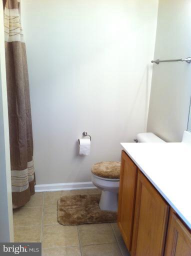 6394 Stagg Court Springfield, VA 22150 - Photo 7 of 10 a bathroom with a sink and toilet