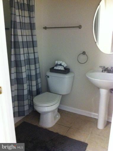 6394 Stagg Court Springfield, VA 22150 - Photo 8 of 10 a bathroom with a toilet and a sink