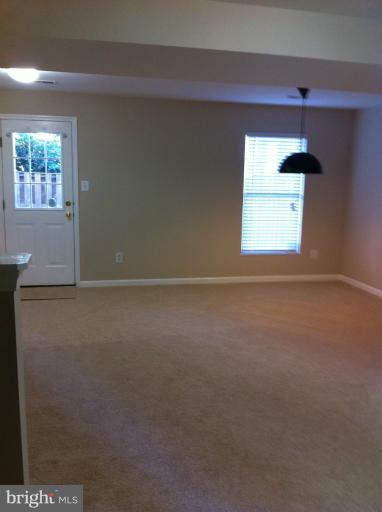 6394 Stagg Court Springfield, VA 22150 - Photo 9 of 10 a view of an empty room with a window