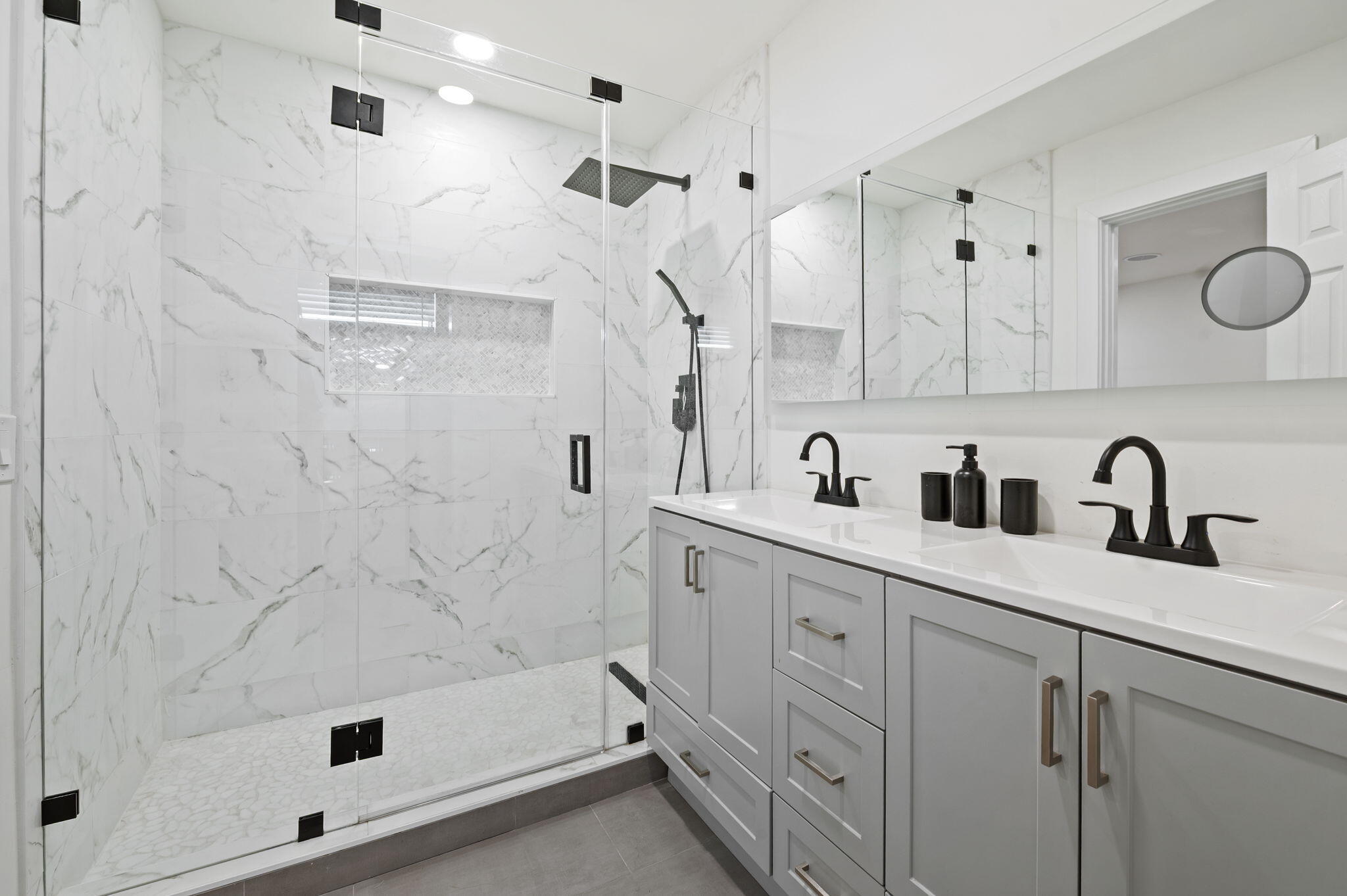 5420 Johnson Street Hollywood, FL 33021 - Photo 13 of 26 a bathroom with double sink and a shower