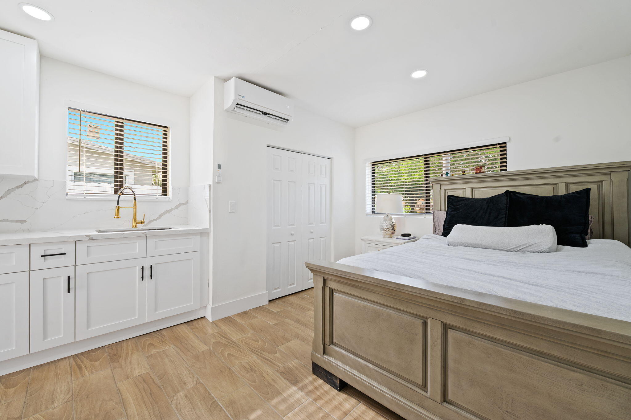 5420 Johnson Street Hollywood, FL 33021 - Photo 24 of 26 a bedroom with a bed and a window