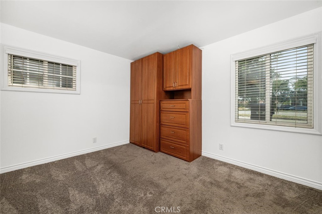 1238 North Studebaker Road Long Beach, CA 90815 - Photo 26 of 47 a view of an empty room with a window