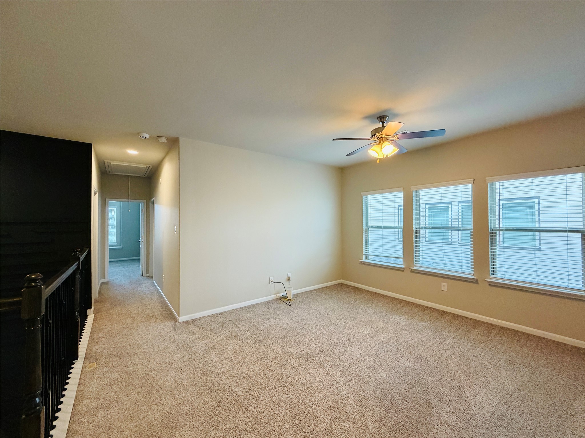 3318 Rainflower Springs Lane Rosenberg, TX 77471 - Photo 15 of 19 a view of an empty room with a window