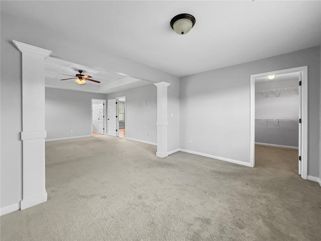 6 Pebblebrook Lane Fort Mitchell, AL 36856 - Photo 20 of 48 Carpeted spare room featuring a ceiling fan and baseboards