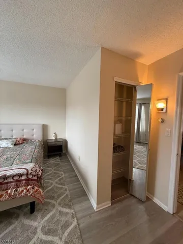 a bathroom with a shower and a toilet