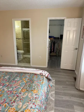 a lobby with a couch and a rug