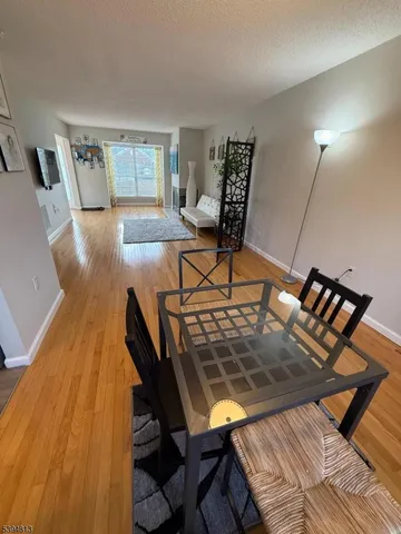 a kitchen with stainless steel appliances granite countertop a stove a sink dishwasher and a refrigerator