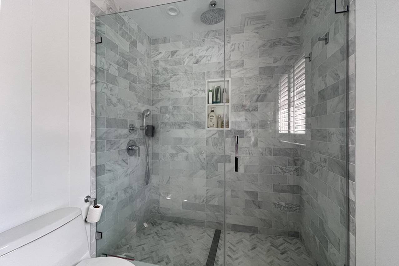 475 7 Ponds Towd Road Water Mill, NY 11976 - Photo 12 of 18 a bathroom with a shower and toilet