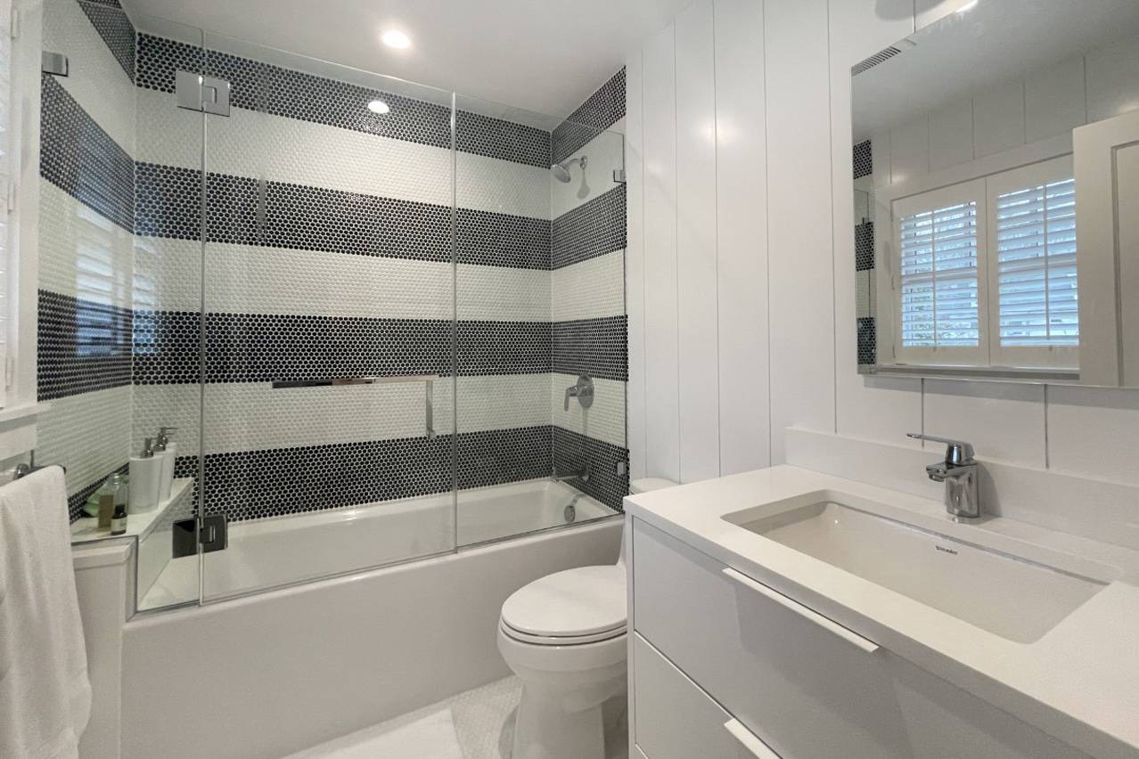 475 7 Ponds Towd Road Water Mill, NY 11976 - Photo 17 of 18 a bathroom with a sink a toilet and shower