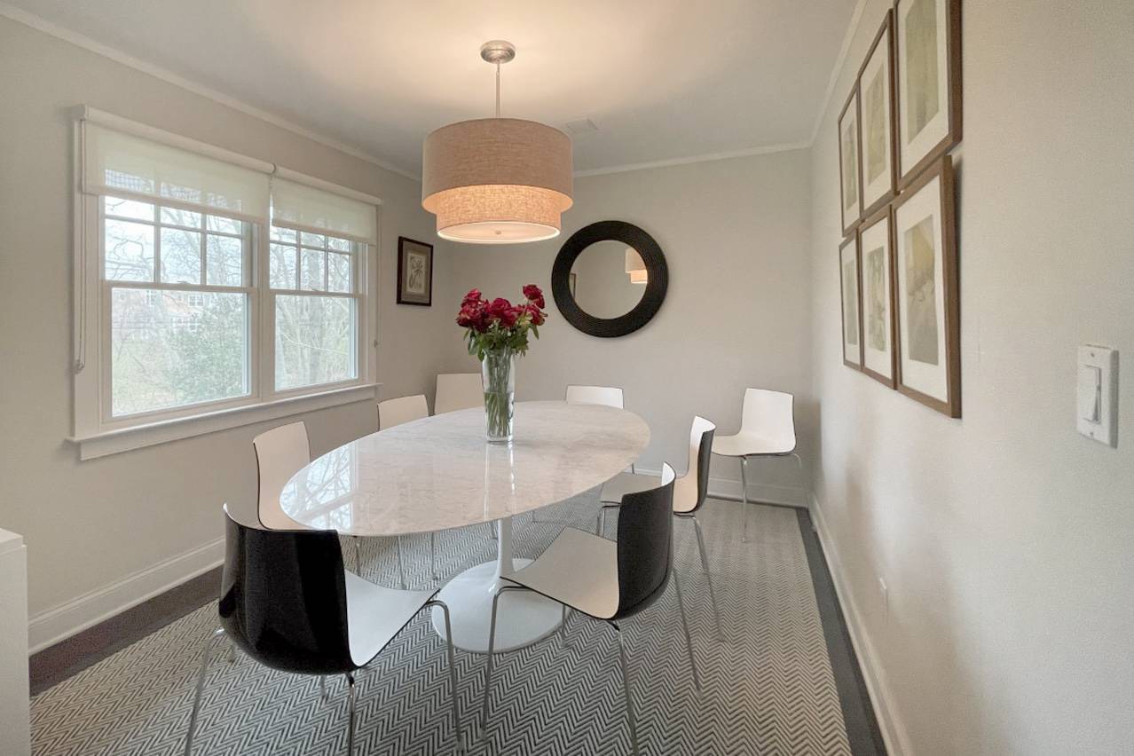 475 7 Ponds Towd Road Water Mill, NY 11976 - Photo 3 of 18 a view of a dining room that has a table and a chair in it