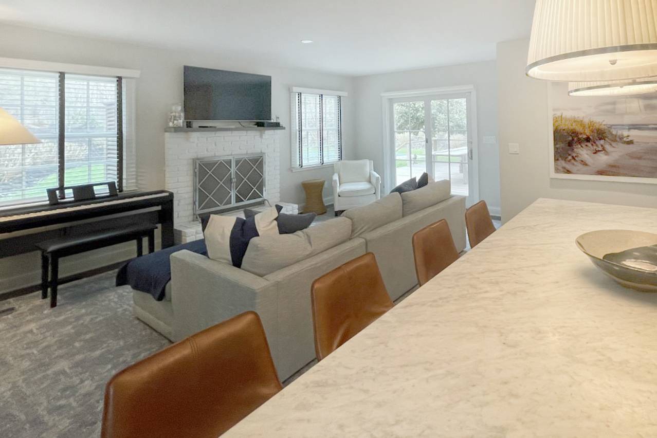 475 7 Ponds Towd Road Water Mill, NY 11976 - Photo 8 of 18 a living room with furniture fireplace and flat screen tv