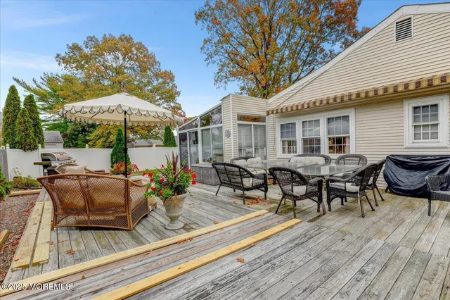 a view of a house with patio outdoor seating
