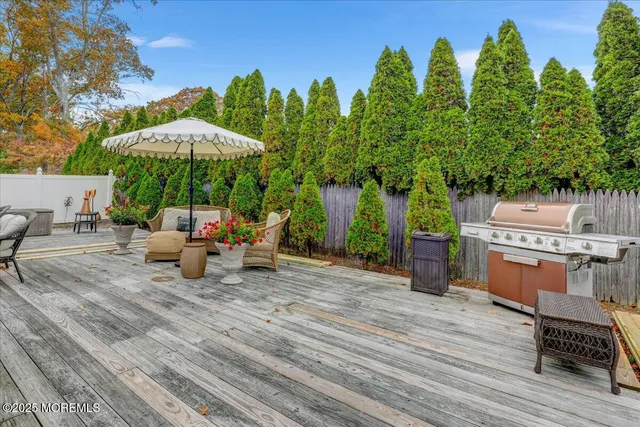 a view of a terrace with sitting area