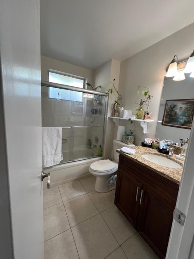 11750 Timbers Way Boca Raton, FL 33428 - Photo 11 of 25 a bathroom with a granite countertop sink toilet and shower